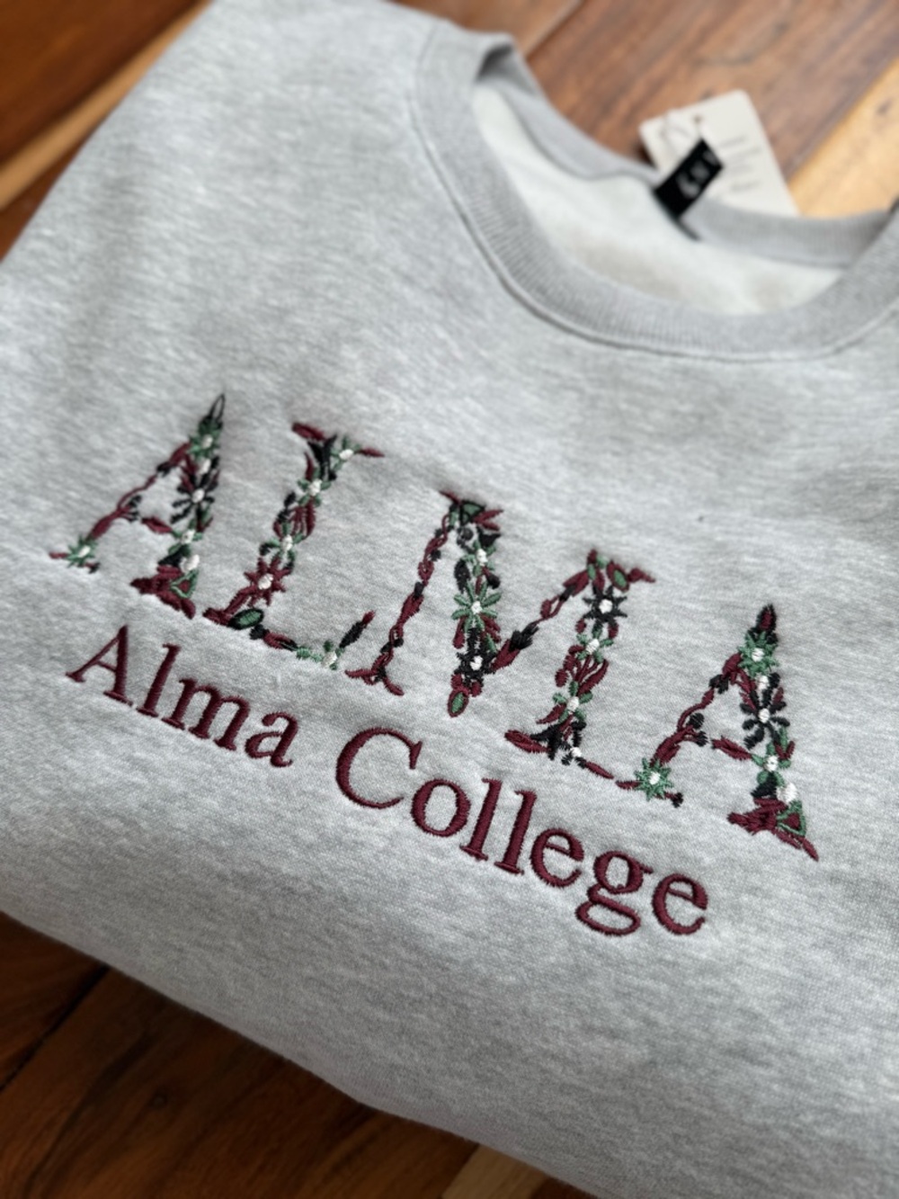 Alma College Gray Crewneck Sweatshirt with Floral Logo